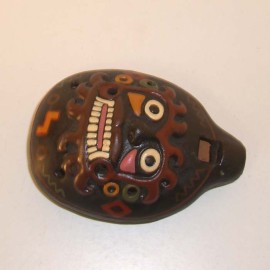 Ocarina avec masque en relief en céramique